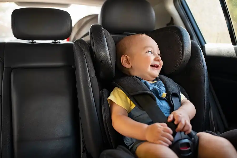 Cute baby in a car seat
